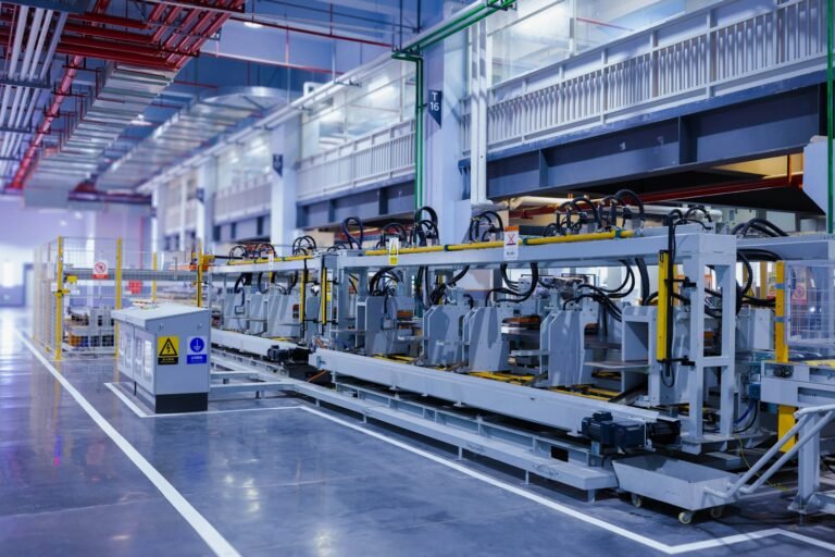 Large industrial machine inside a factory building