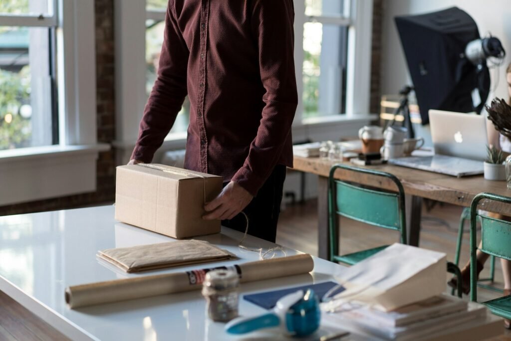 Person packing up a desk after leaving a job