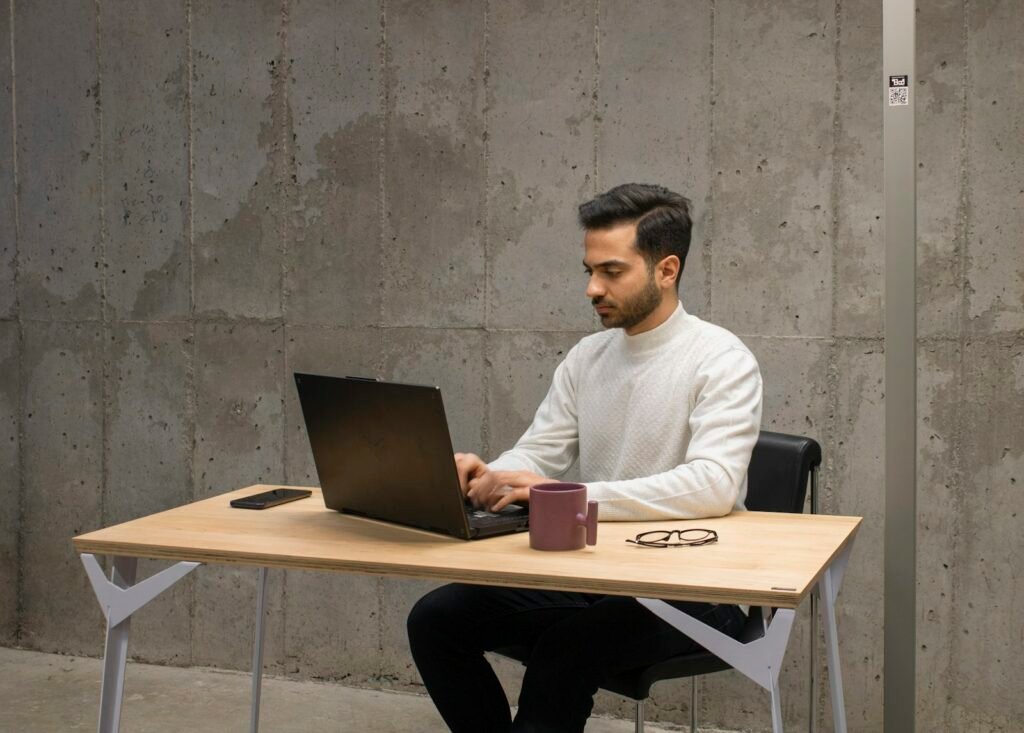 Engineer reviewing documents at a desk