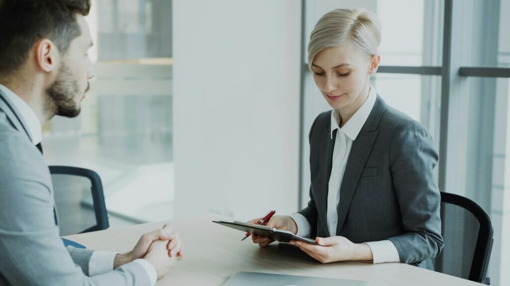Candidate in a formal job interview with a hiring panel