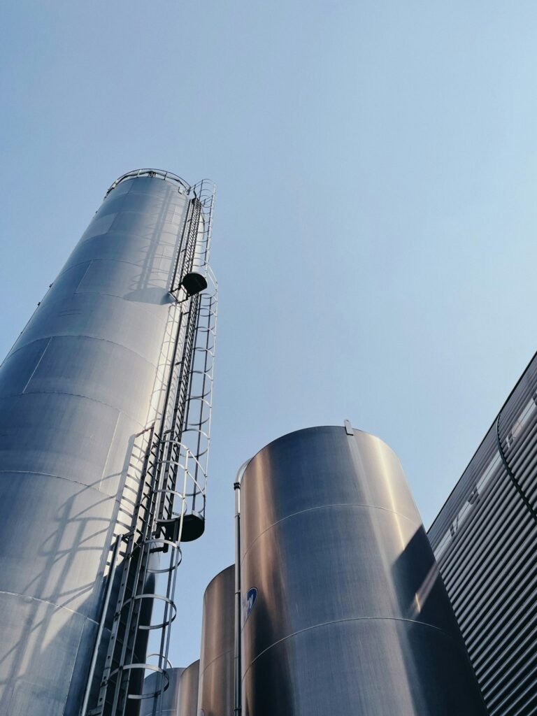 Tall industrial silos with ladders