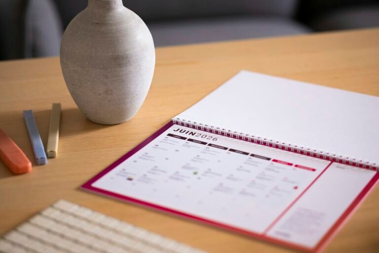 Calendar on a wooden desk for H-1B planning