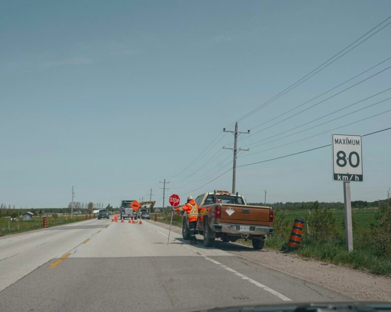 Pickup truck driving to a highway construction work zone