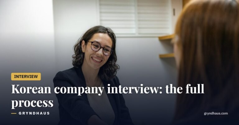 Candidate shaking hands with an interviewer